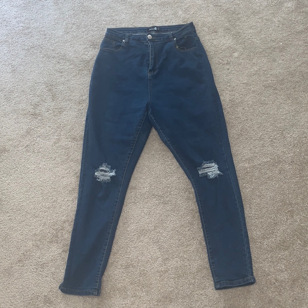 Women’s blue distressed jeans size 14